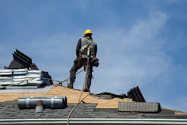 Professional Roofing technician working in North Henderson, IL
